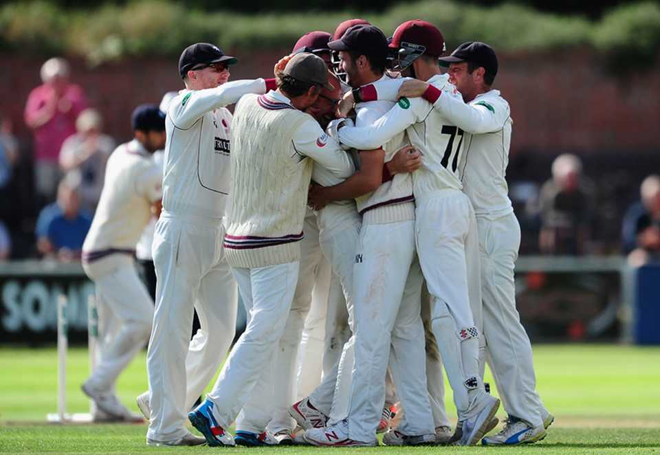 Somerset's players celebrate victory on the third morning at Taunton