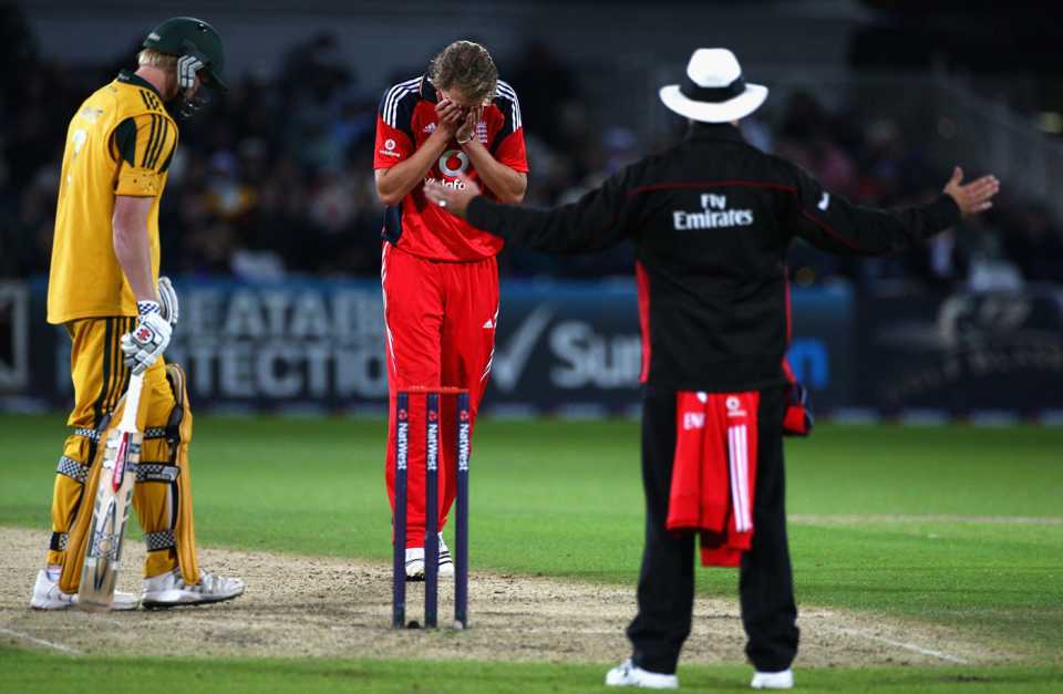 Stuart Broad holds his head in his hands after being given a wide