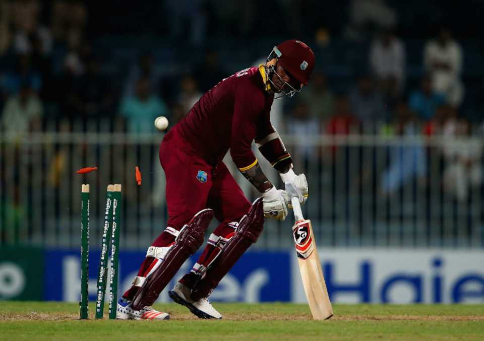 Marlon Samuels's stumps are clattered by a Wahab Riaz yorker