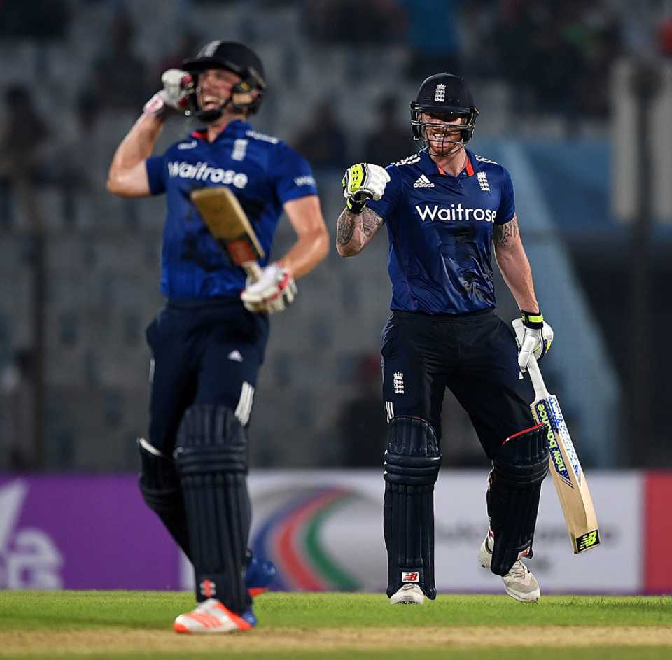 Chris Woakes and Ben Stokes celebrate the winning moment