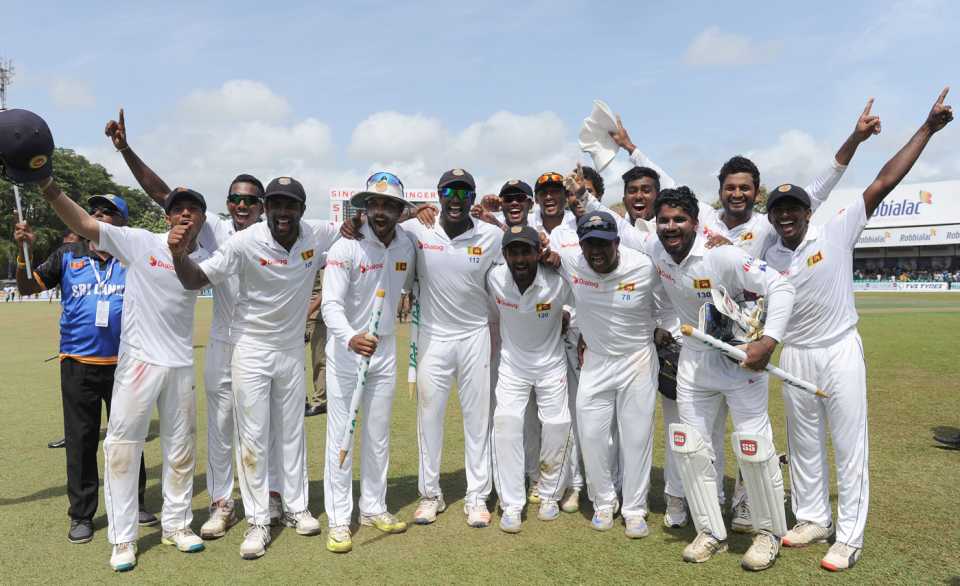The Sri Lanka team celebrate their historic victory