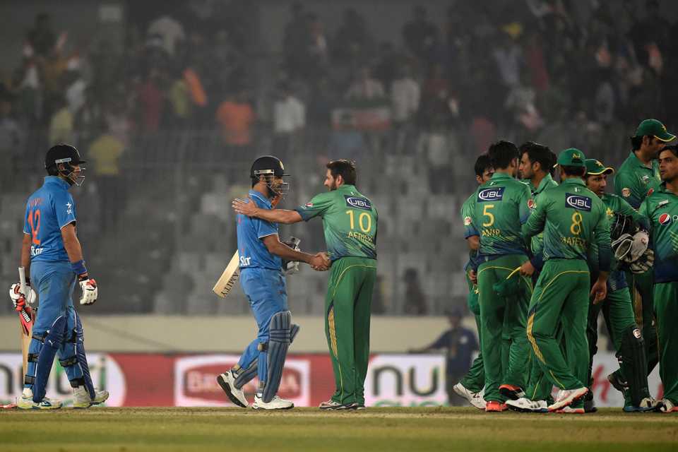 MS Dhoni and Shahid Afridi shake hands at the end of the match, India v Pakistan, Asia Cup, Mirpur, February 27, 2016