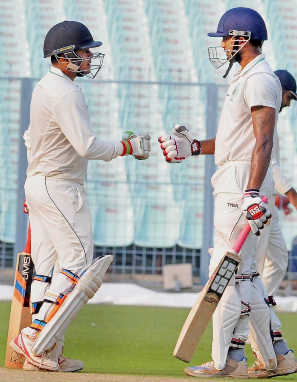 KB Arun Karthik and Swarupam Purkayastha greet each other after putting up the only fifty partnership of the match