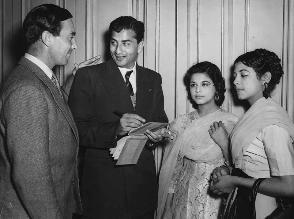 Denis Compton greets Fazal Mahmood, who is signing autographs for fans