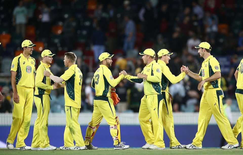 Australian players celebrate after winning the match and clinching the Chappell-Hadlee series