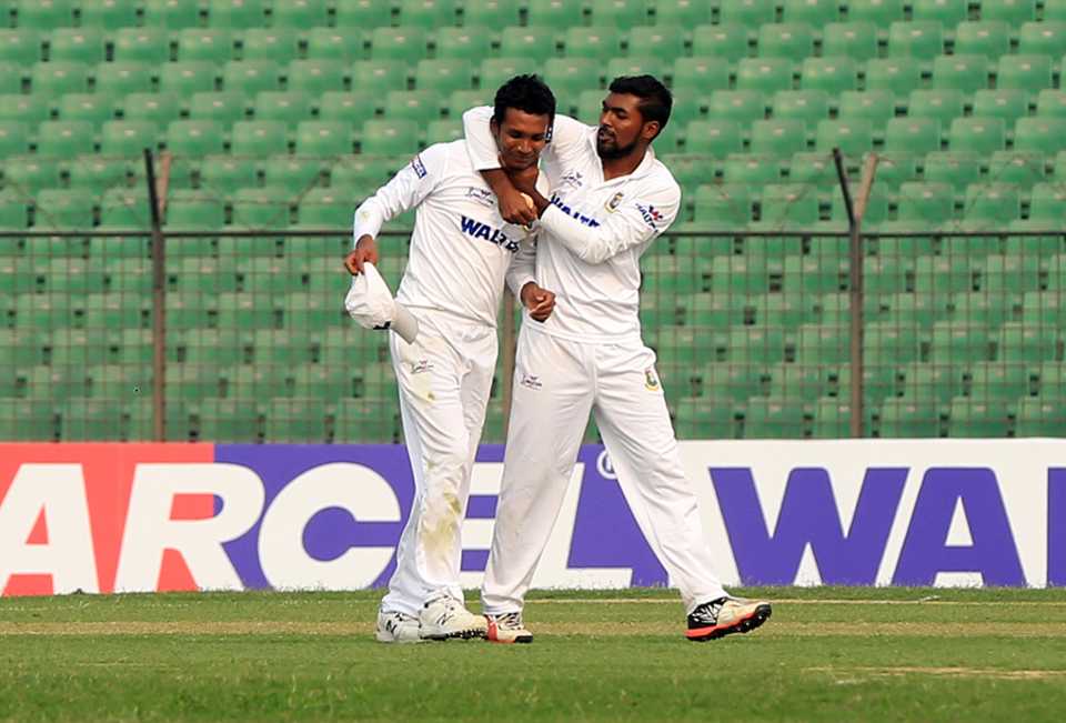 Nazmul Islam (right) picked up 3 for 46