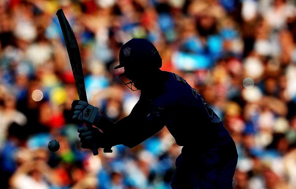  Jake Weatherald of the Strikers is silhouetted against the Adelaide Oval as he bats