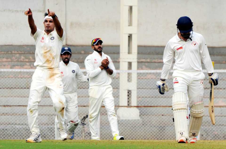 Siddarth Kaul celebrates a wicket