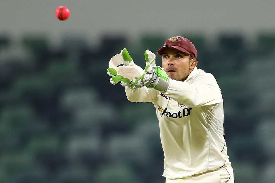 Chris Hartley keeps wicket