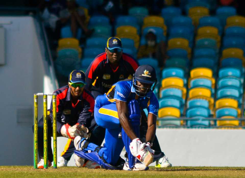 Jonathan Carter sweeps for a boundary during his 79, Barbados v Combined Campuses and Colleges, Regional Super50, Group B, Bridgetown, February 11, 2017