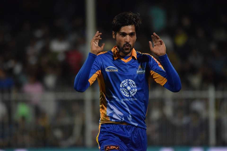 Mohammad Amir reacts after bowling a delivery