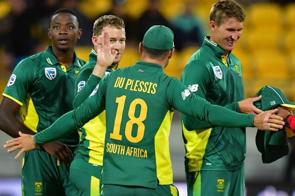 David Miller and Faf du Plessis celebrate with team-mates after South Africa's win