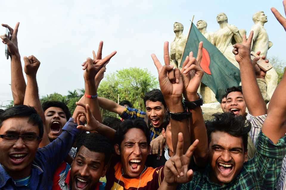Fans in Dhaka celebrate Bangladesh's final-day win in Colombo, Dhaka, March 19, 2017