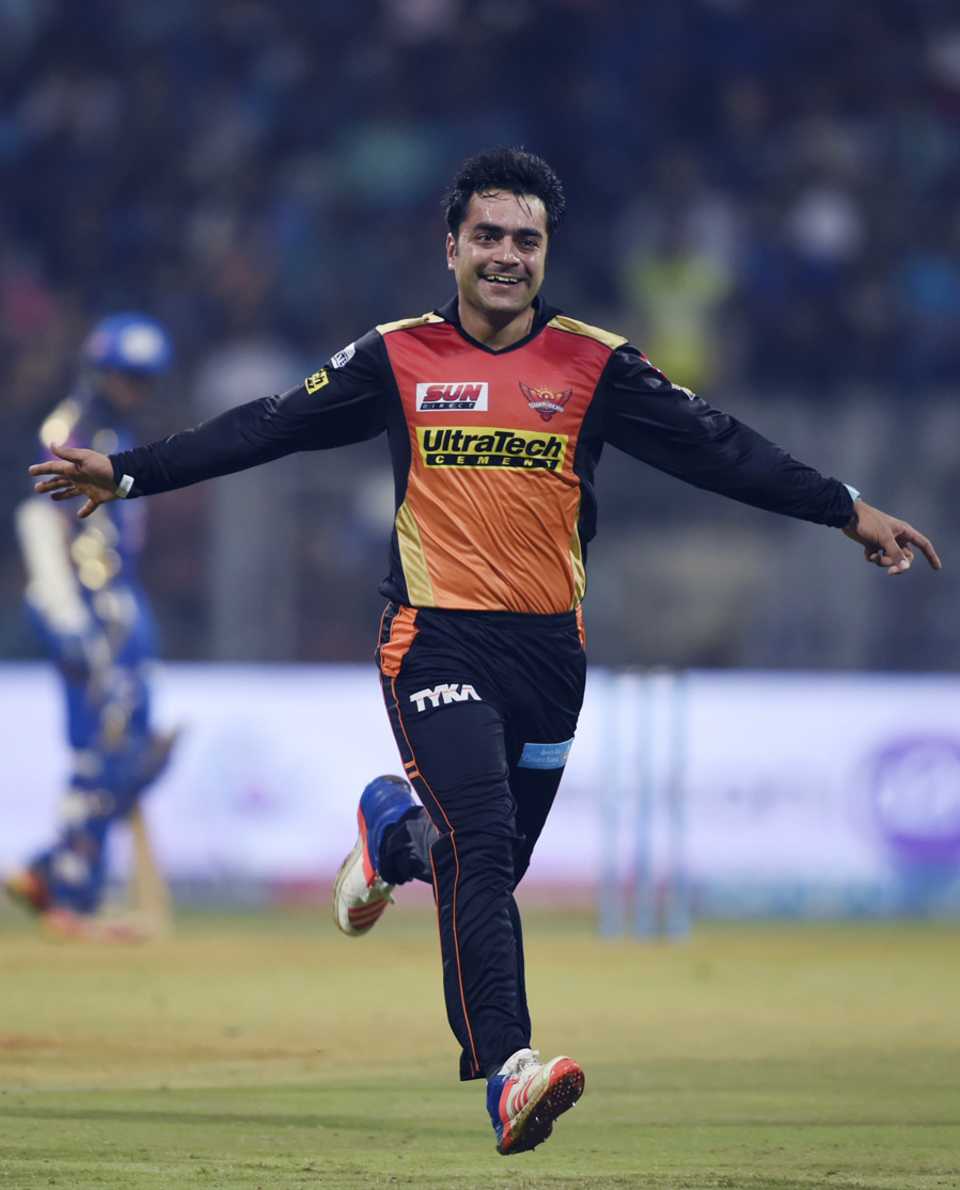 Rashid Khan exults after trapping Rohit Sharma in front
