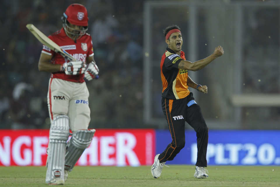 Siddarth Kaul punches in the air after bowling Wriddhiman Saha