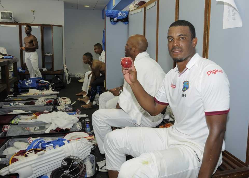 Shannon Gabriel poses with the match ball inside the dressing room
