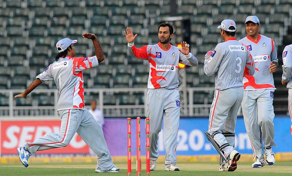 Shoaib Malik celebrates a wicket