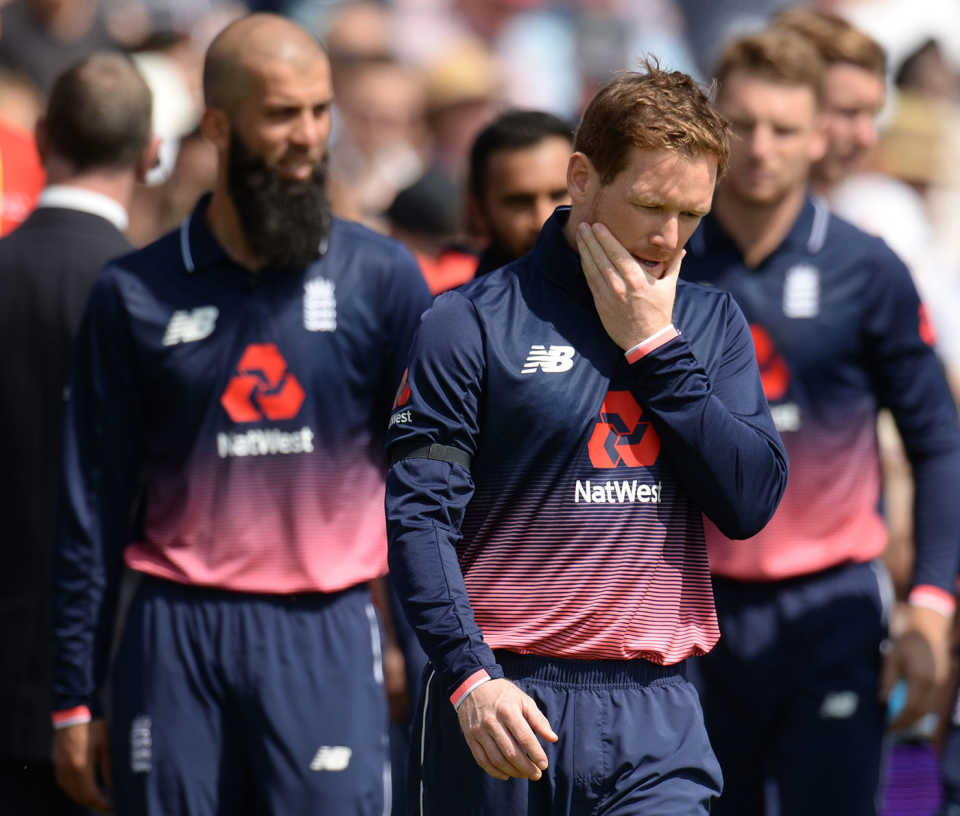 Eoin Morgan leads his team out