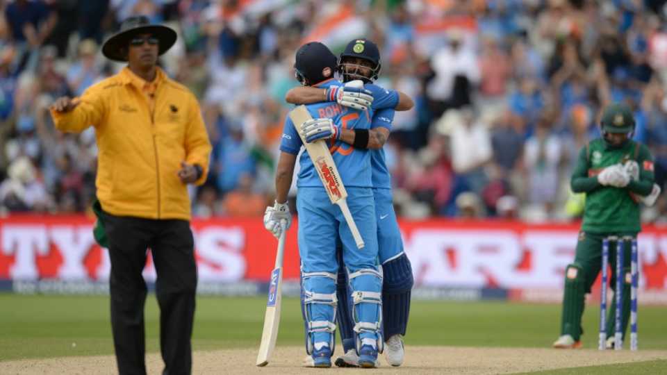 Virat Kohli and Rohit Sharma embrace after India completed the win, Bangladesh v India, Champions Trophy 2017, Edgbaston, June 15, 2017