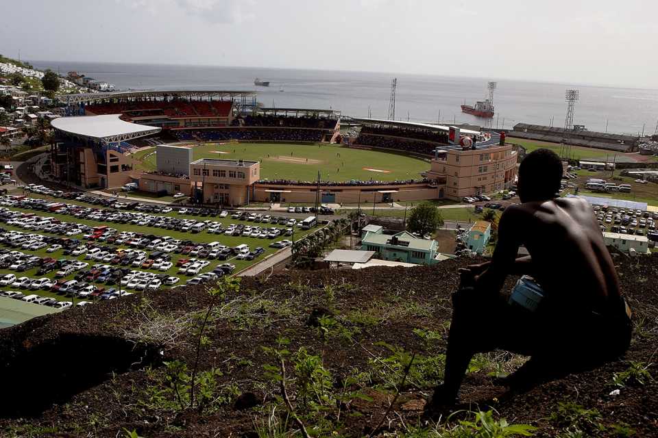 A spectator finds a vantage point on a hill from where to watch the ODI, West Indies v Australia, 3rd ODI, St George's, Grenada, June 29, 2008