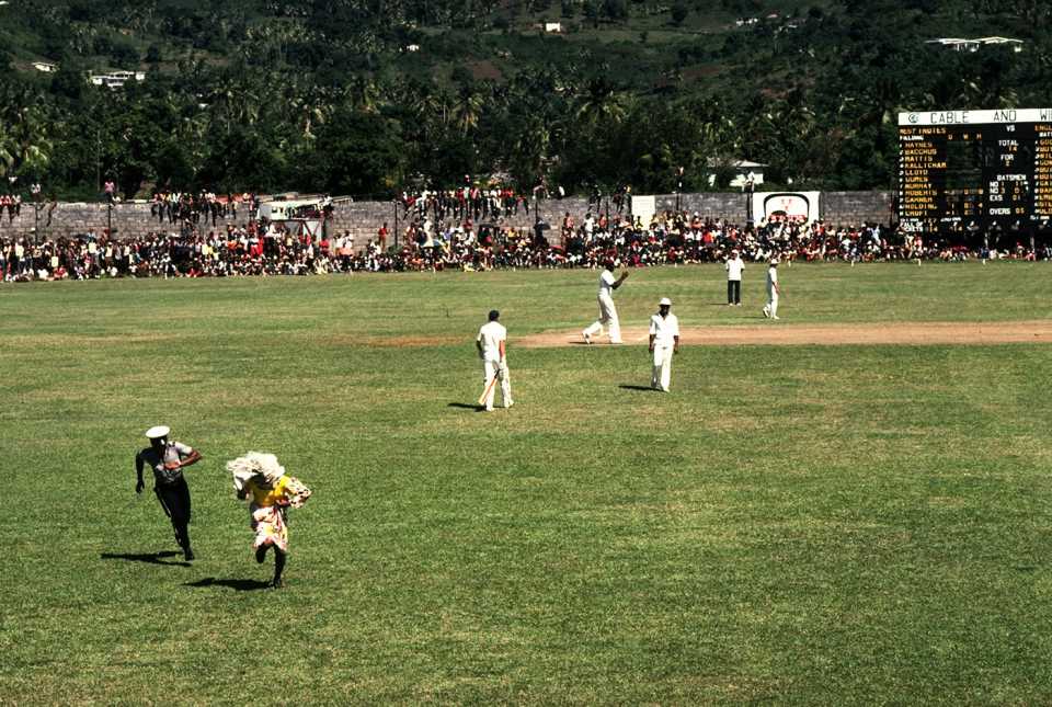 A security personnel chases a spectator who ran into the field to scare the England players with voodoo, West Indies v England, 4th ODI, Kingstown, St Vincent, February 4, 1981
