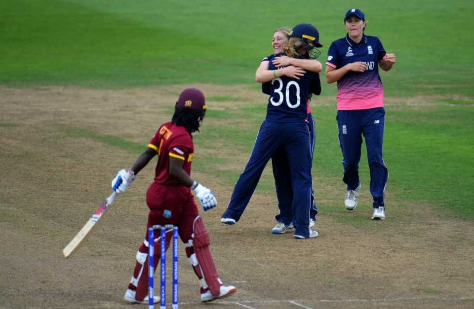 Heather Knight and Sarah Taylor embrace after Deandra Dottin's wicket