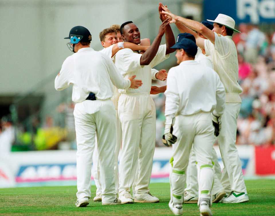 Devon Malcolm celebrates one of his nine second-innings wickets