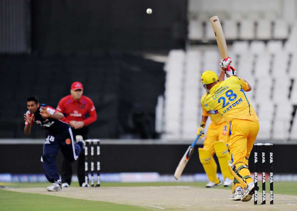 Matthew Hayden hits Pradeep Sangwan straight down the wicket