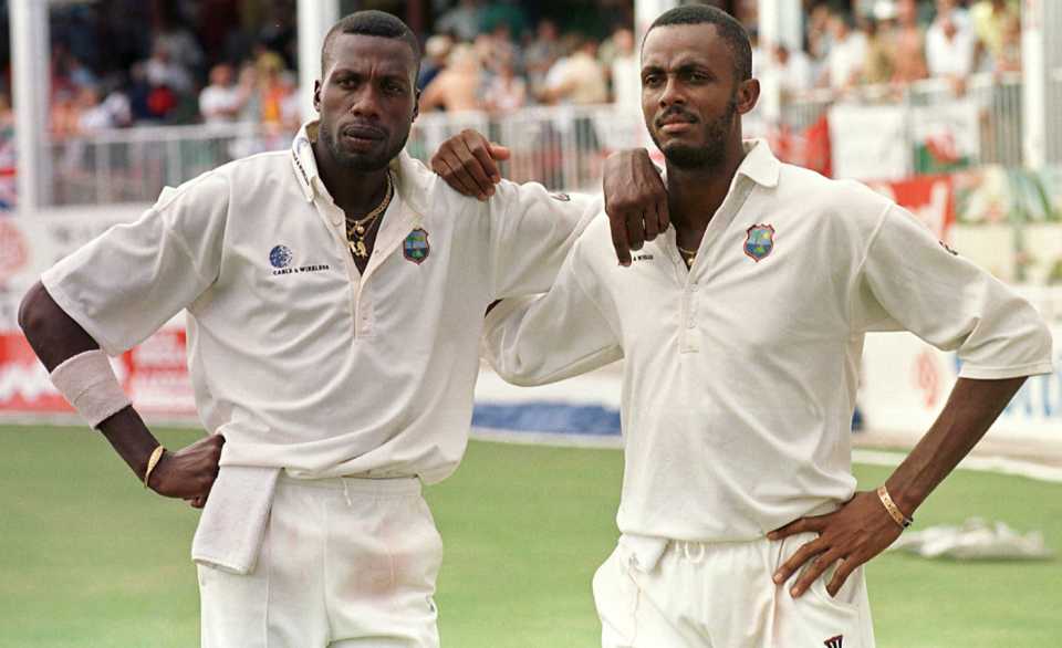 Curtly Ambrose and Courtney Walsh relax after the day's play, West Indies v England, 6th Test, Antigua, 4th day, March 23, 1998