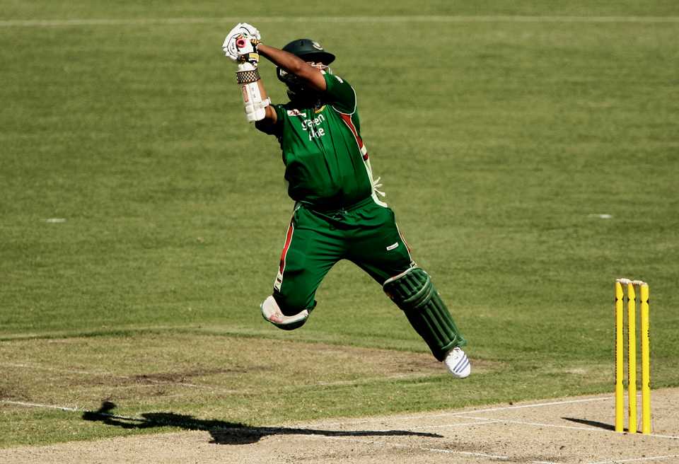 Tamim Iqbal leaps in the air to play a shot behind the wicket