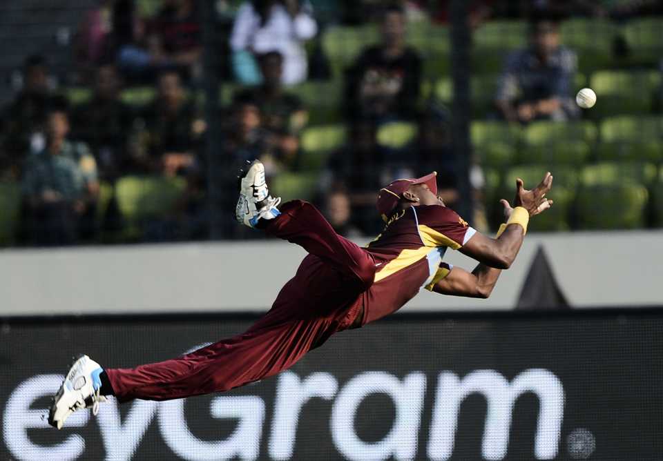 Dwayne Bravo dives to take a catch, Australia v West Indies, World T20, Group 2, Mirpur, March 28, 2014