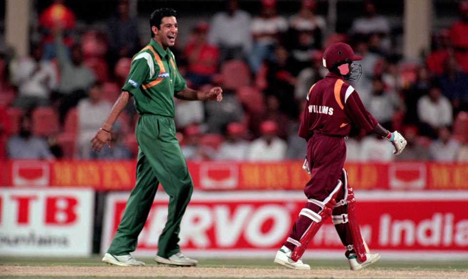 Wasim Akram laughs after the fall of a West Indies wicket