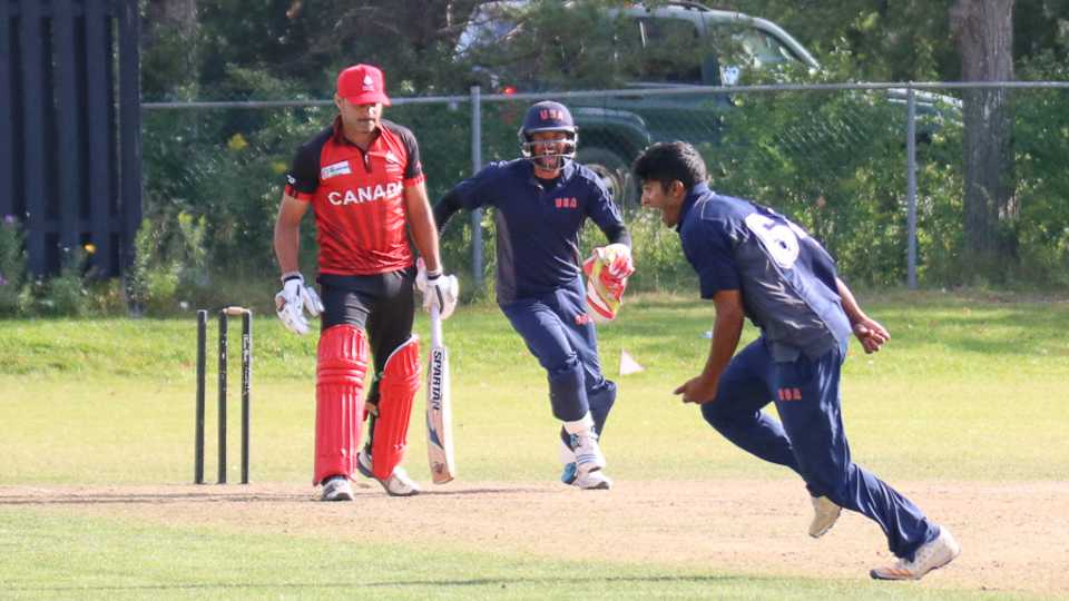 Nosthush Kenjige sprints away after bowling Rizwan Cheema to complete a hat-trick