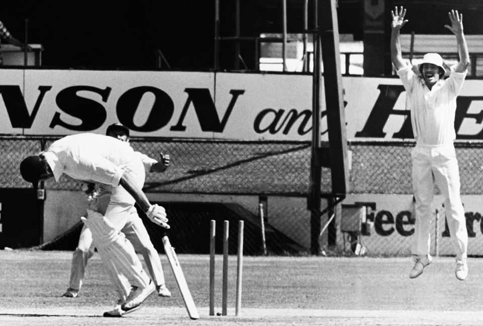 Tony Greig is bowled for 2 by Jeff Thomson