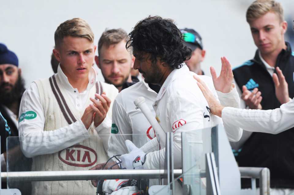 Sadness for Kumar Sangakkara as he returns to the Surrey dressing room after his final first-class innings