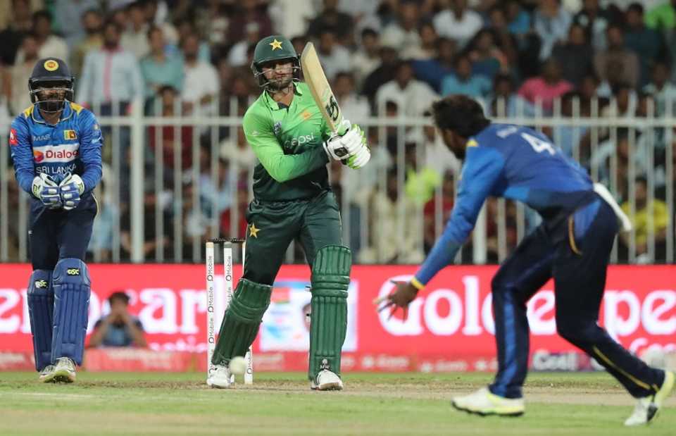 Shoaib Malik punches down the ground