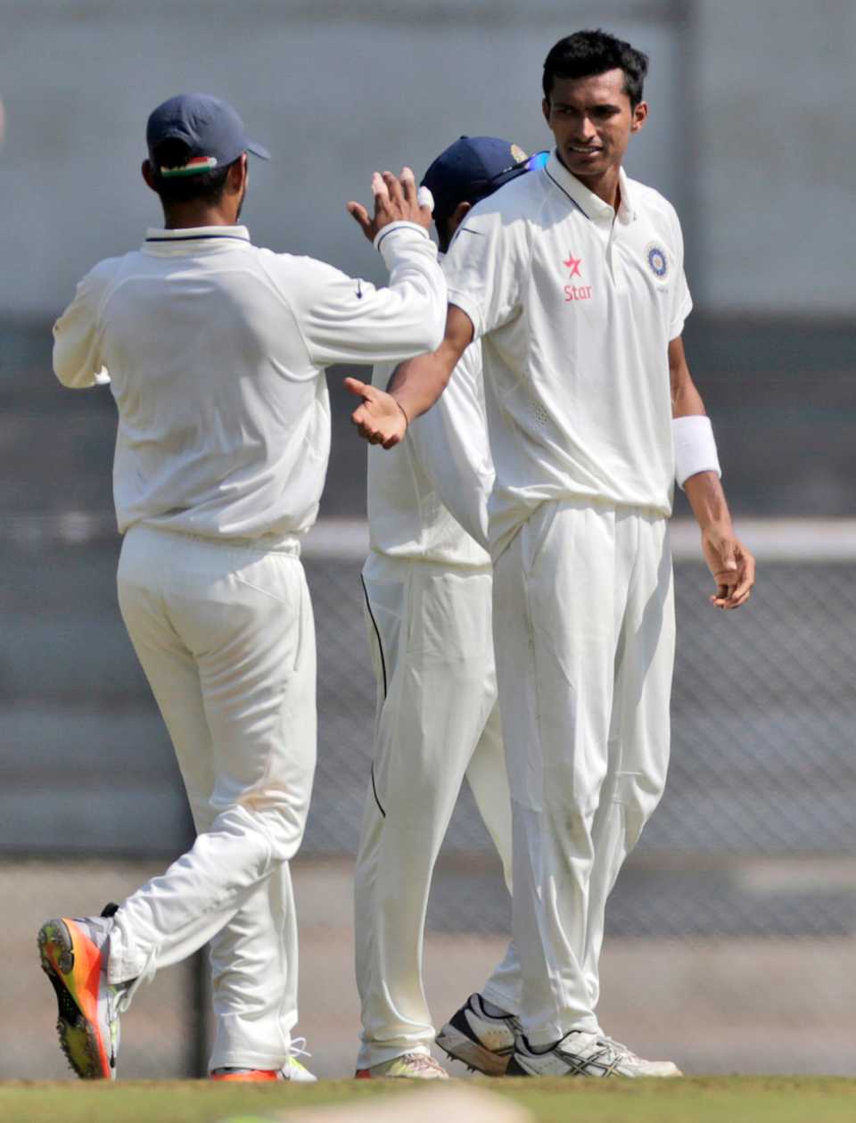 Navdeep Saini celebrates a wicket