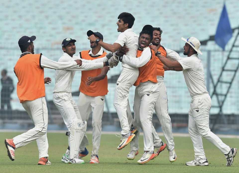 Rajneesh Gurbani is mobbed by his team-mates