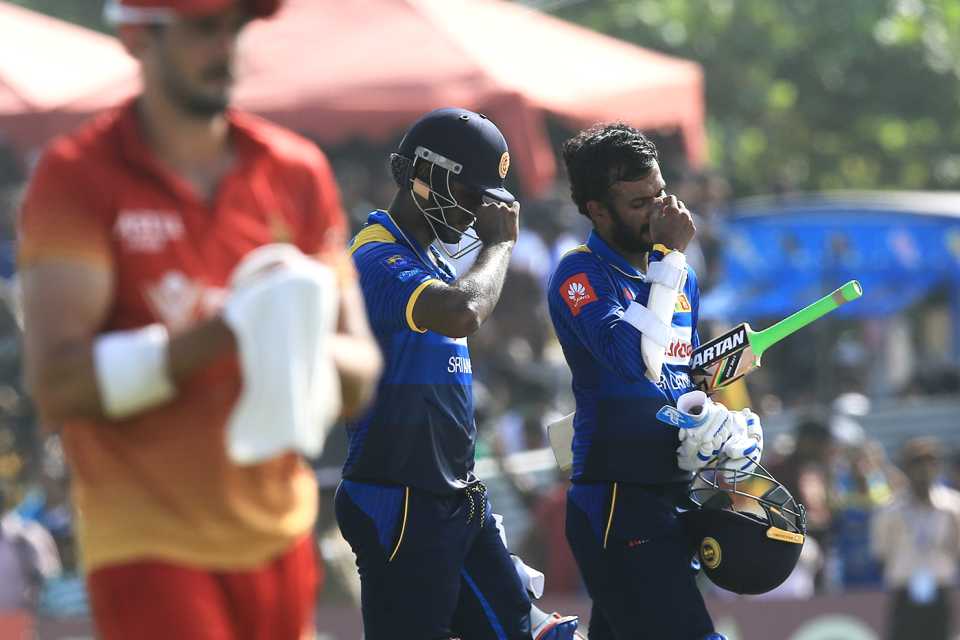 Angelo Mathews and Upul Tharanga walk back, Sri Lanka v Zimbabwe, 2nd ODI, Galle, July 2, 2017