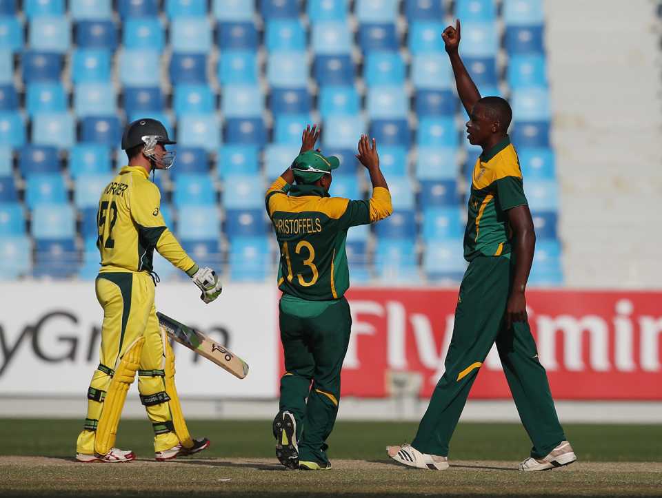 Kagiso Rabada and Kirwin Christoffels celebrate a wicket