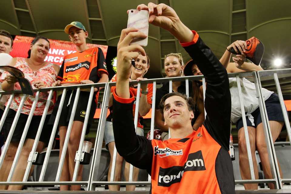 Jhye Richardson poses for selfies with fans