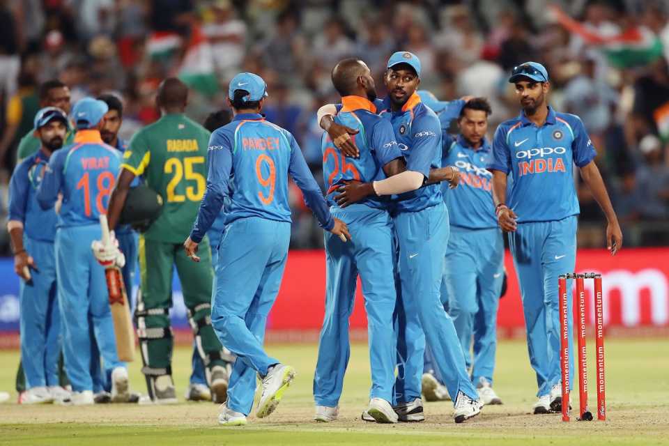 India celebrate their 124-run win in Cape Town