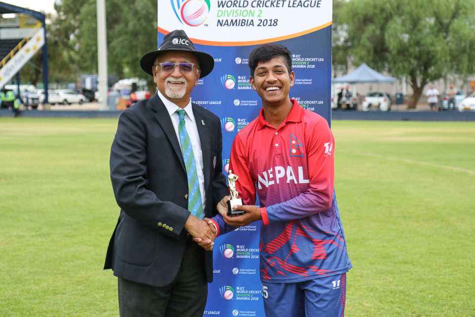 Sandeep Lamichhane receives his Man of the Match award from ICC match referee Dev Govindjee, Namibia v Nepal, ICC World Cricket League Division Two, Windhoek, February 8, 2018