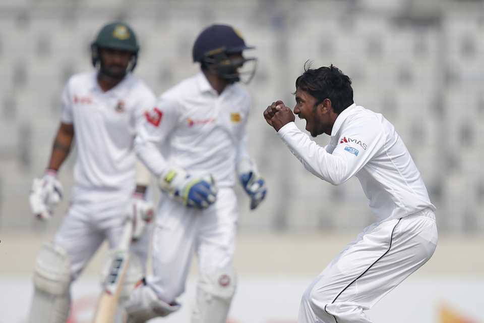 Akila Dananjaya celebrates a wicket on debut