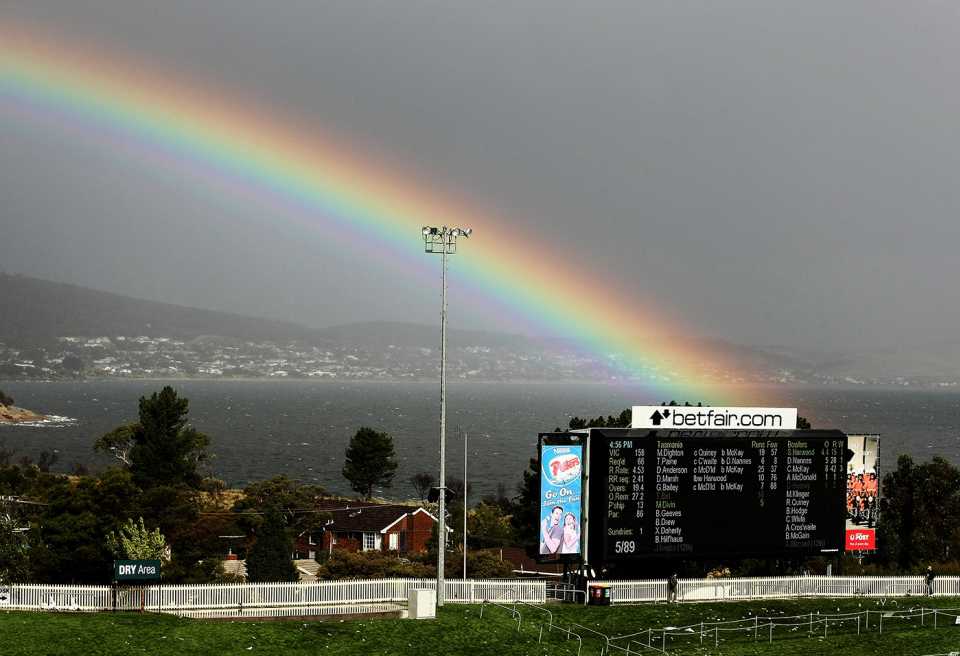 A rainbow appears over the scoreboard in Hobart