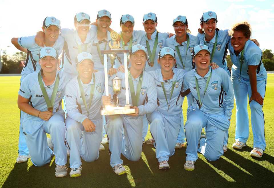 New South Wales women pose with the WNCL trophy
