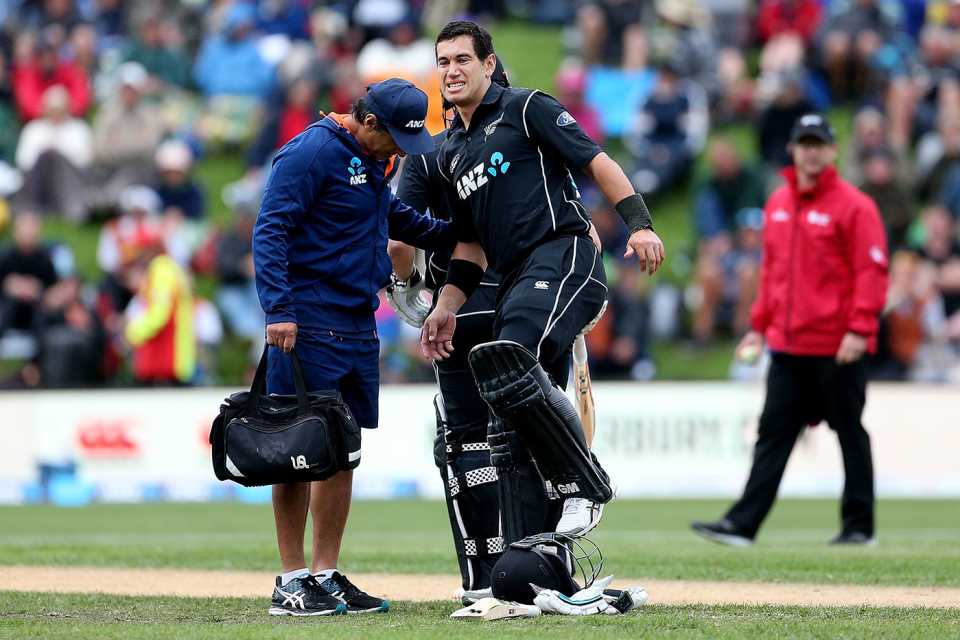Ross Taylor gets treatment during his century