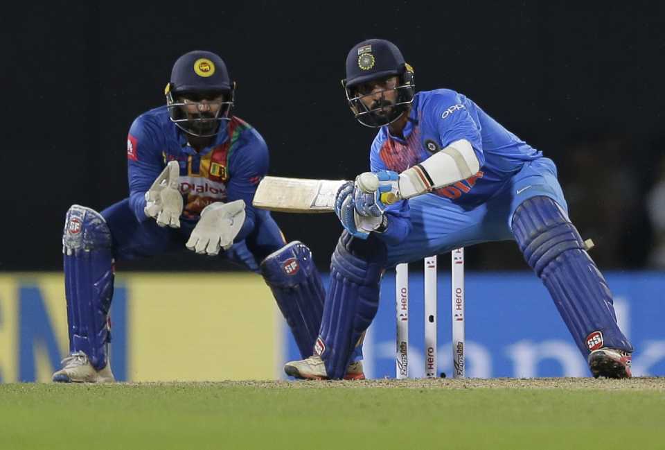 Dinesh Karthik looks to scoop one away, Sri Lanka v India, 4th match, Nidahas Trophy, Colombo, March 12, 2018