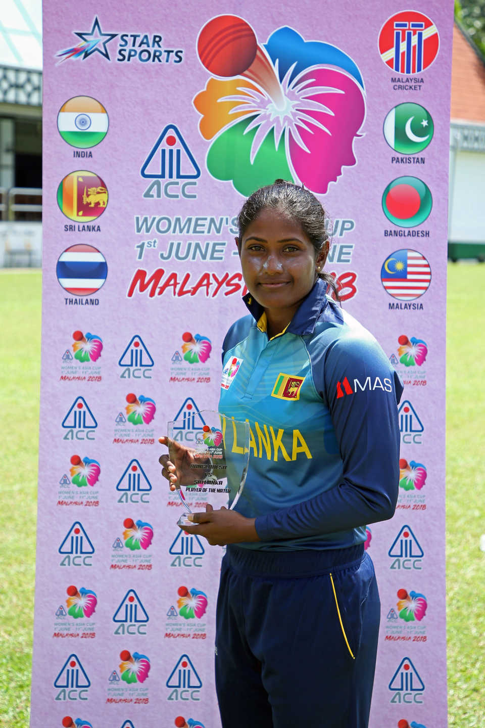 Sugandika Kumari poses with the Player-of-the-Match award