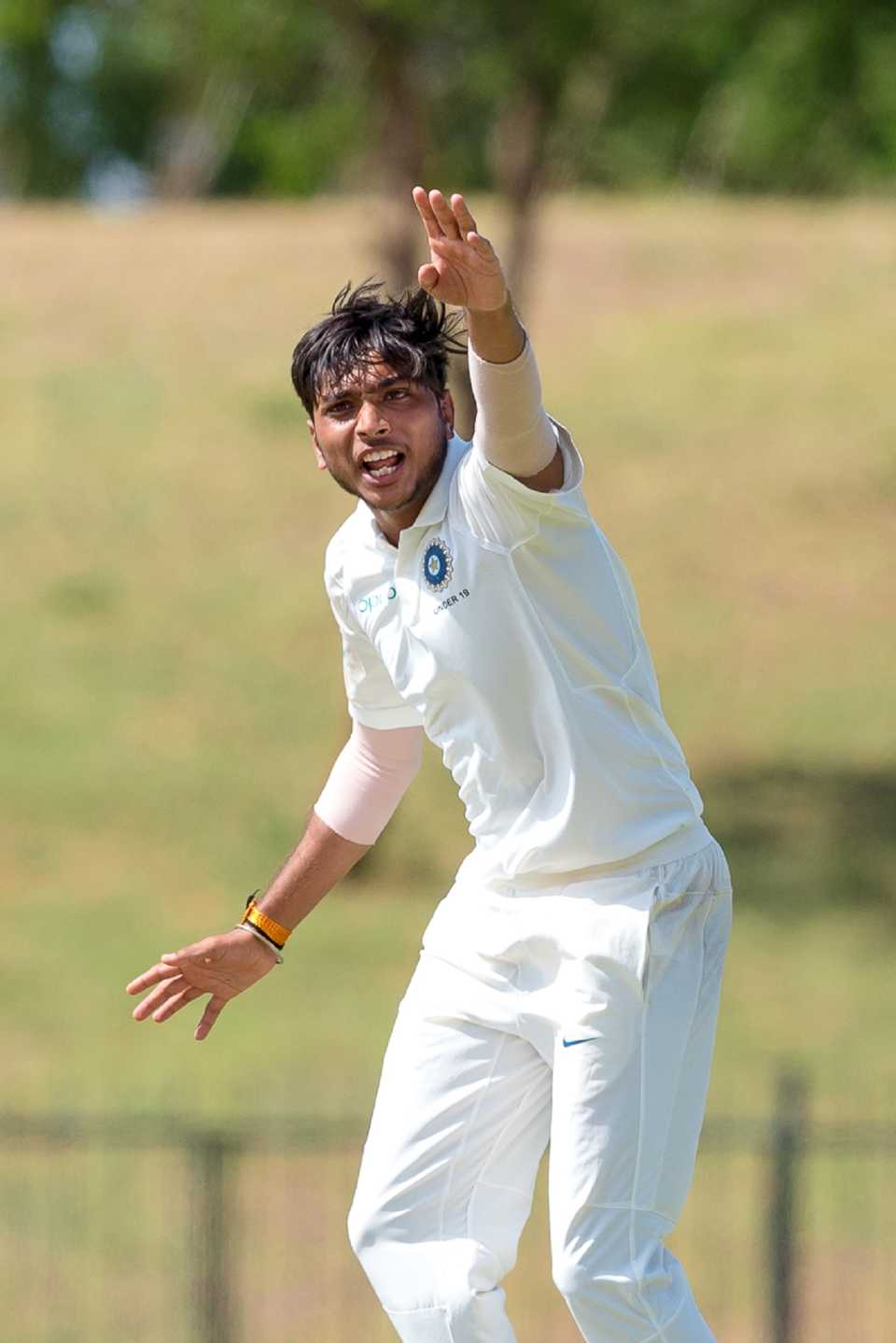 Left-arm spinner Siddharth Desai goes up in appeal